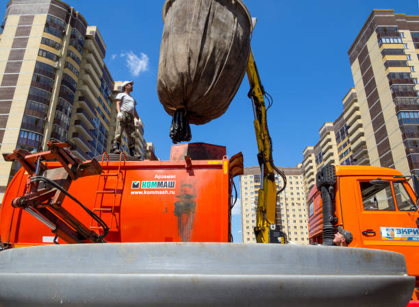 Unloading the contents of a buried dumpster