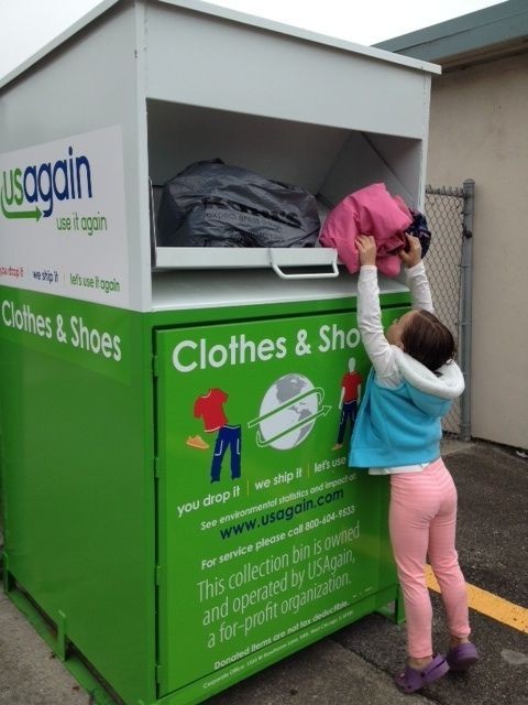 Galvanized Steel Clothes & Shoes Donation Bin in use