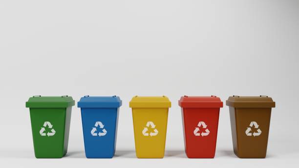 Colored recycling bins for waste collection and separation.