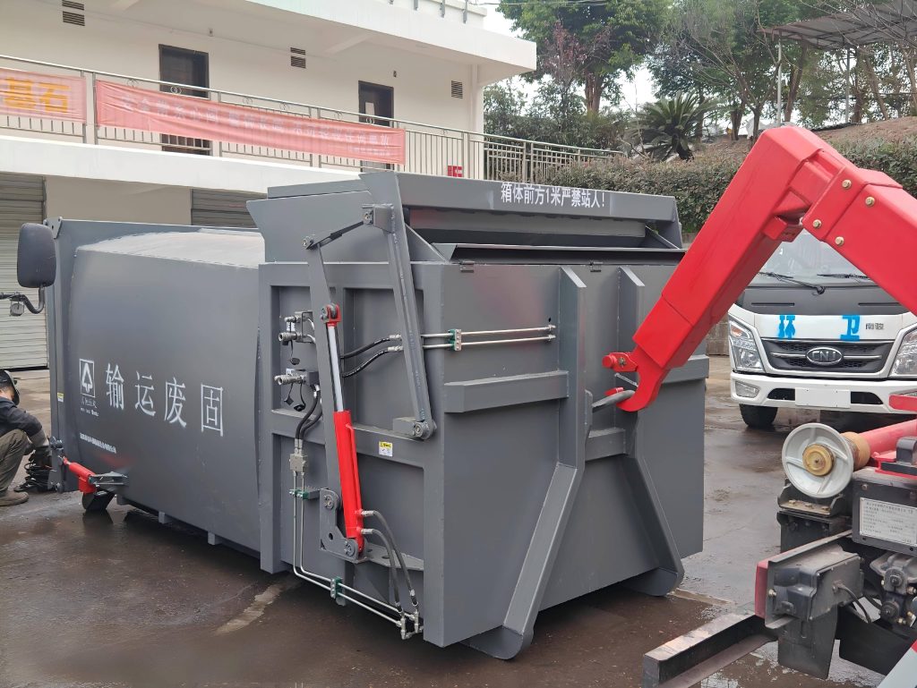 7m³ Mobile Compactor Bin (With Hopper) onsite