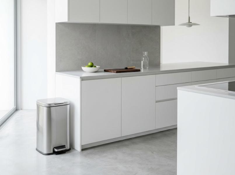 Stainless steel pedal bin in a modern kitchen